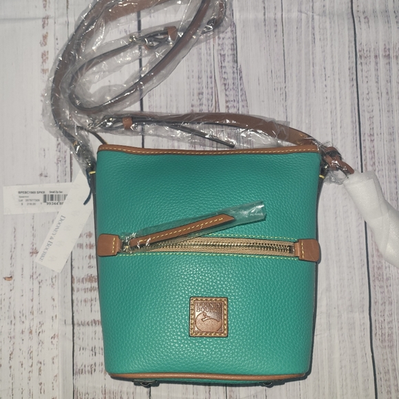 Dooney & Bourke Handbags - NWT Spearmint color small Dooney & Burke Crossybody